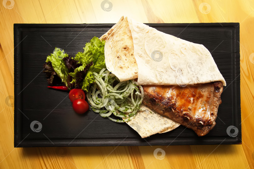 Скачать Свиные ребрышки на гриле фотосток Ozero