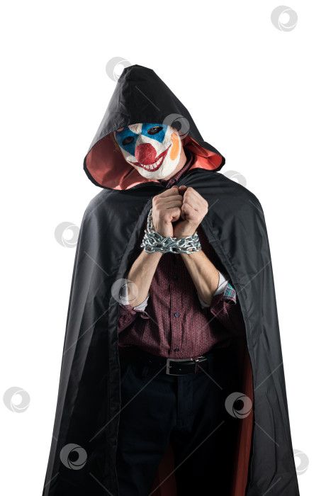 Скачать Клоун со скованными руками. На белом изолированном фоне. фотосток Ozero