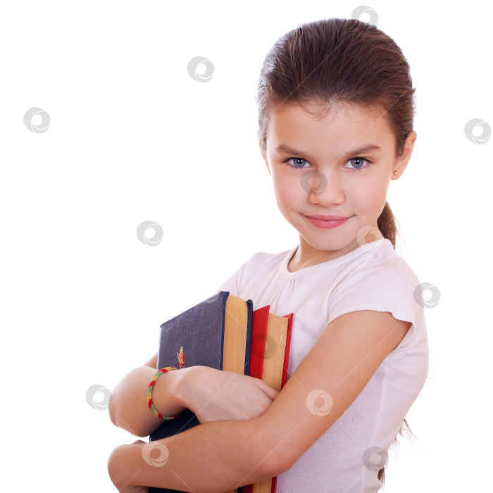 Скачать Образование, молодая красивая школьница держит в руках учебники фотосток Ozero