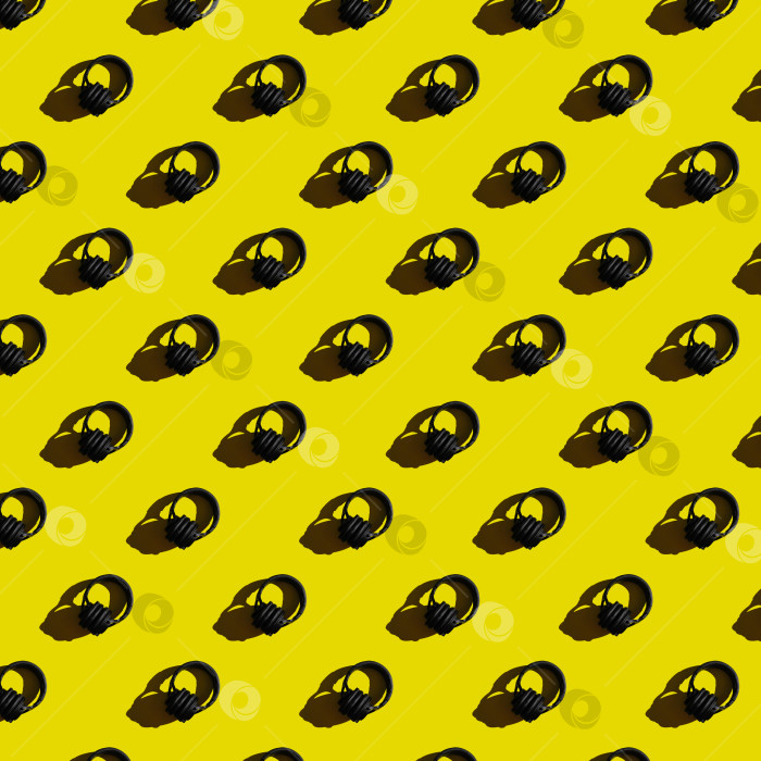 Скачать Черные наушники, на фото бесшовные. Узор на тему наушников, музыки. фотосток Ozero