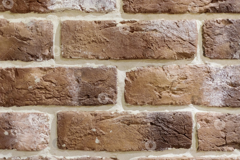 Скачать Стена с кирпичной кладкой под старый разрушенный кирпич светло-бежевого цвета. фотосток Ozero