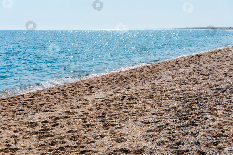 Скачать Пляж с водоемом на заднем плане фотосток Ozero