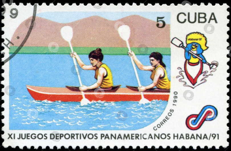 Скачать КУБА - ОКОЛО 1990 года: Почтовая марка с изображением КУБЫ, Панамериканских игр 1991 года в Гаване, Куба, гребля на байдарках, около 1990 года фотосток Ozero