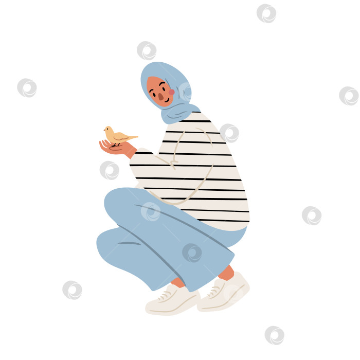 Скачать Плоская векторная иллюстрация мусульманской женщины в хиджабе и полосатом свитере. Женский персонаж сидит на корточках, нежно держа в руках маленькую птичку. Доброе взаимодействие с природой, современный образ жизни человека. фотосток Ozero