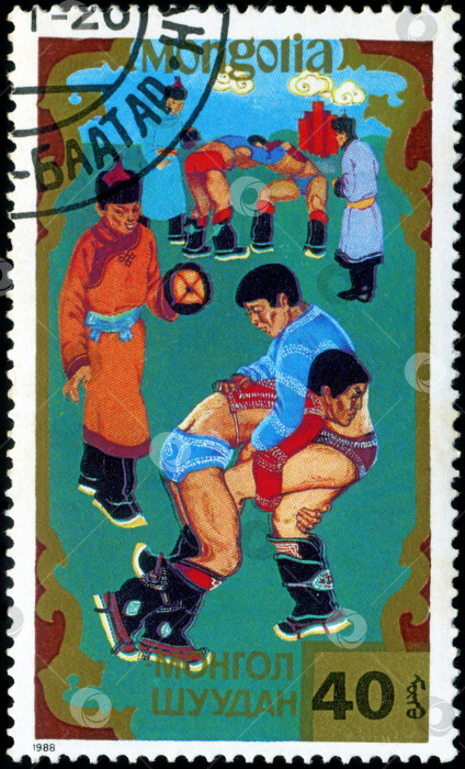 Скачать МОНГОЛИЯ - ОКОЛО 1988 года: марка, отпечатанная Монголией, изображает монгольскую борьбу, около 1988 года фотосток Ozero