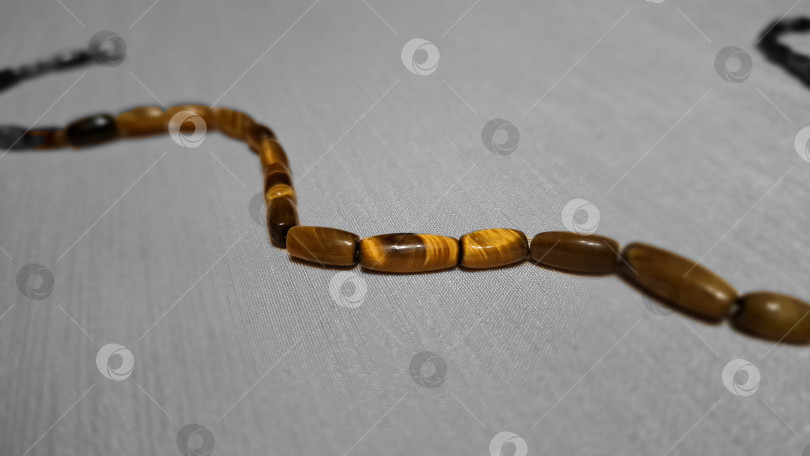 Скачать Нить натурального камня "тигровый глаз" фотосток Ozero