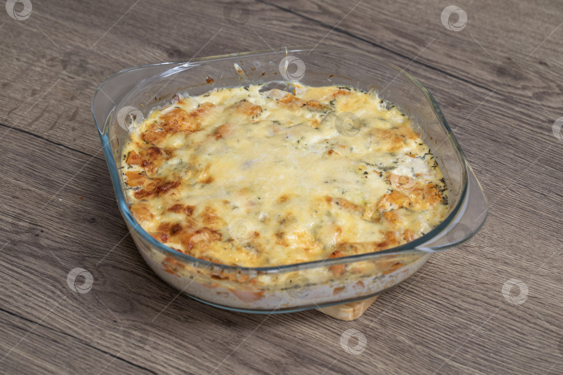 Скачать Домашнее блюдо - Запеканка из курицы и тыквы фотосток Ozero