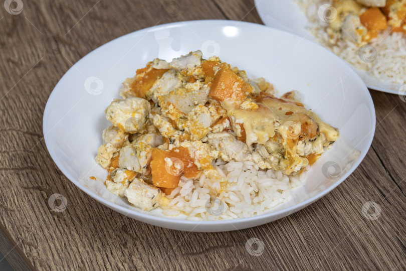 Скачать Домашнее блюдо - Запеканка из курицы и тыквы фотосток Ozero