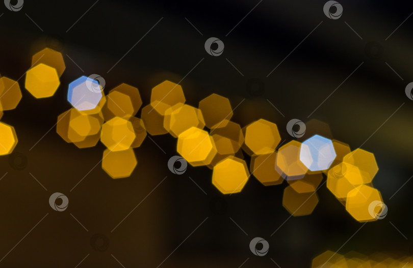 Скачать Боке с желто-белыми огоньками шестигранными (фон) фотосток Ozero
