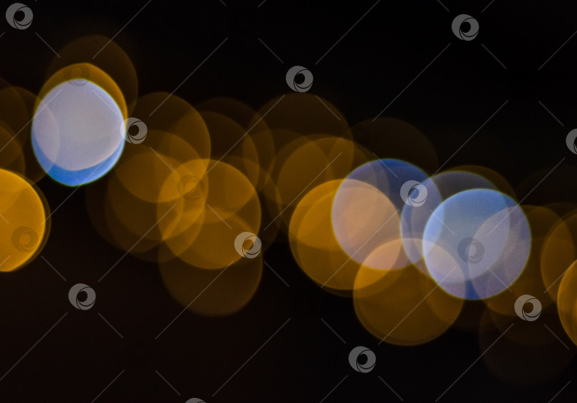 Скачать Боке с жёлто-бело-голубыми огоньками (фон) фотосток Ozero