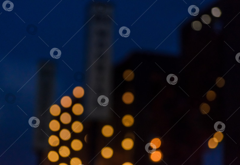 Скачать Размытый ночной городской свет с эффектом желтого и оранжевого боке фотосток Ozero
