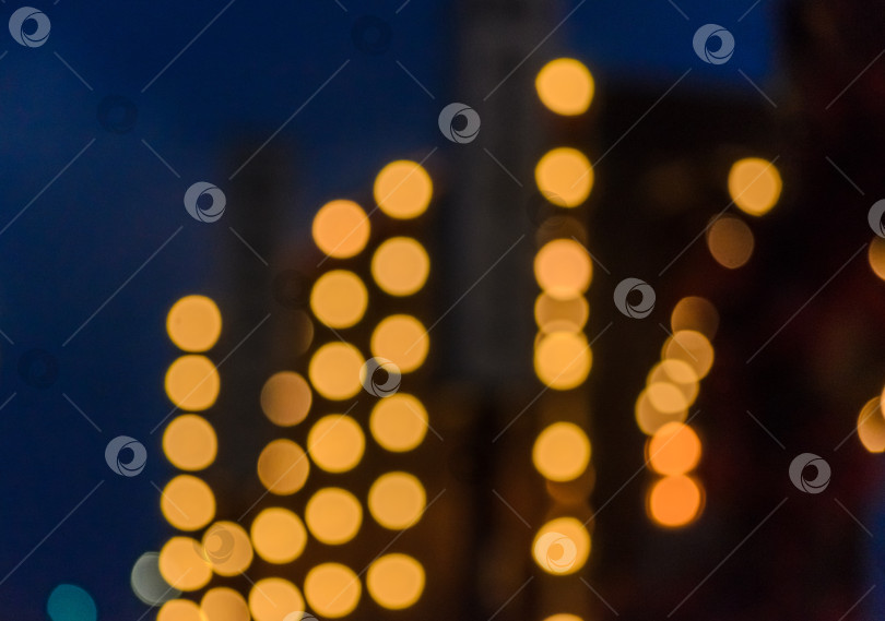 Скачать Размытый ночной городской свет с эффектом желтого и оранжевого боке фотосток Ozero