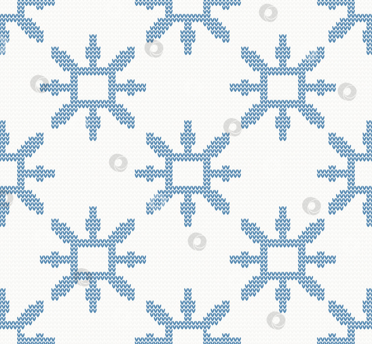 Скачать Рождественский вязаный бесшовный узор с голубыми снежинками фотосток Ozero