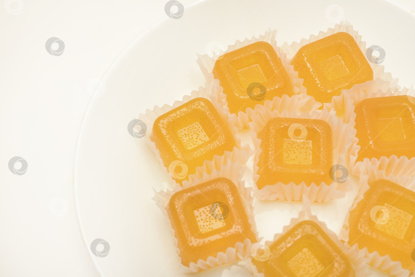 Скачать Апельсиновый мармелад. Сладкая закуска. Мармелад с разными вкусами и цветами. фотосток Ozero