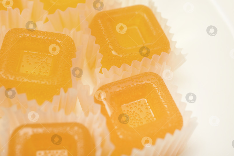 Скачать Апельсиновый мармелад. Сладкая закуска. Мармелад с разными вкусами и цветами. фотосток Ozero