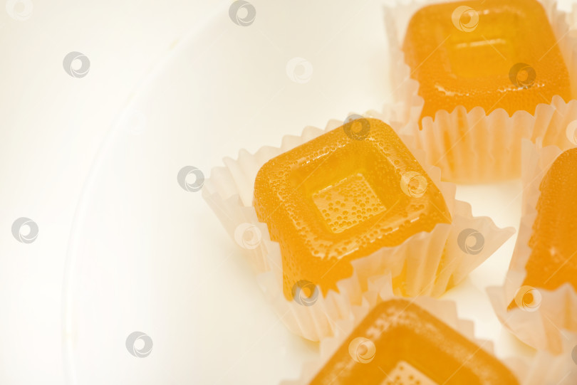 Скачать Апельсиновый мармелад. Сладкая закуска. Мармелад с разными вкусами и цветами. фотосток Ozero