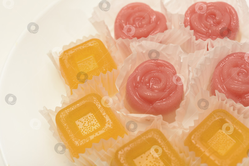 Скачать Апельсиновый мармелад. Сладкая закуска. Мармелад с разными вкусами и цветами. фотосток Ozero