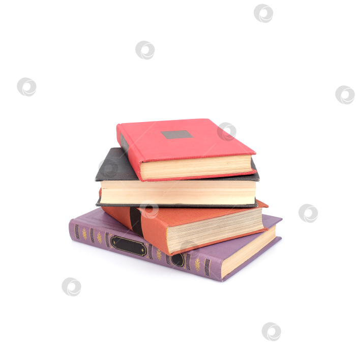 Скачать Стопка красных черных и фиолетовых книг выделяющихся на белом фоне фотосток Ozero