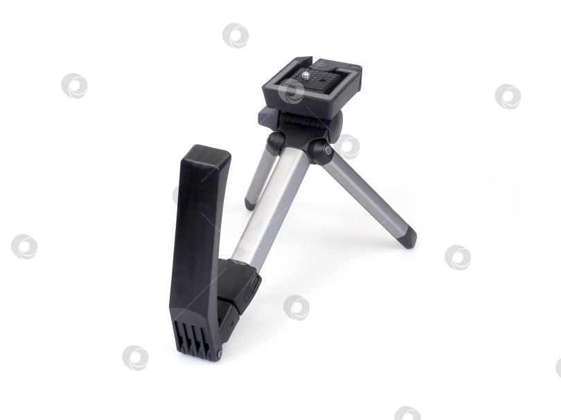 Скачать Плечевая скоба со встроенным мини-штативом для камеры, выделенная на белом фоне, с готовым вырезом. Чрезвычайно высокое разрешение фотосток Ozero