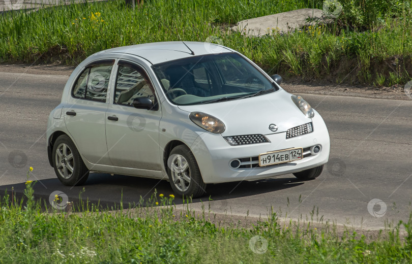 Скачать Россия г.Красноярск 23 мая  2025г. автомобиль Nissan Micra Японский автомобиль фотосток Ozero