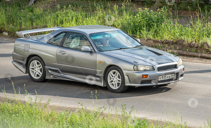 Скачать Россия г.Красноярск 23 мая  2025г. Nissan Skyline Японский автомобиль фотосток Ozero