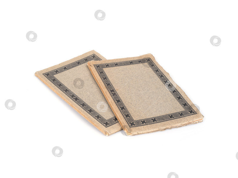 Скачать Две старые книги, выделяющиеся на белом фоне фотосток Ozero