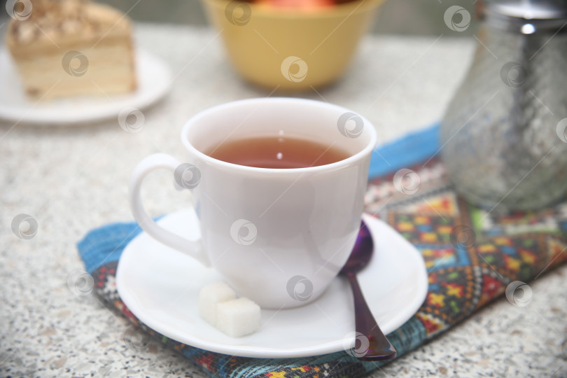 Скачать Чашка черного кофе и  куски сахара фотосток Ozero