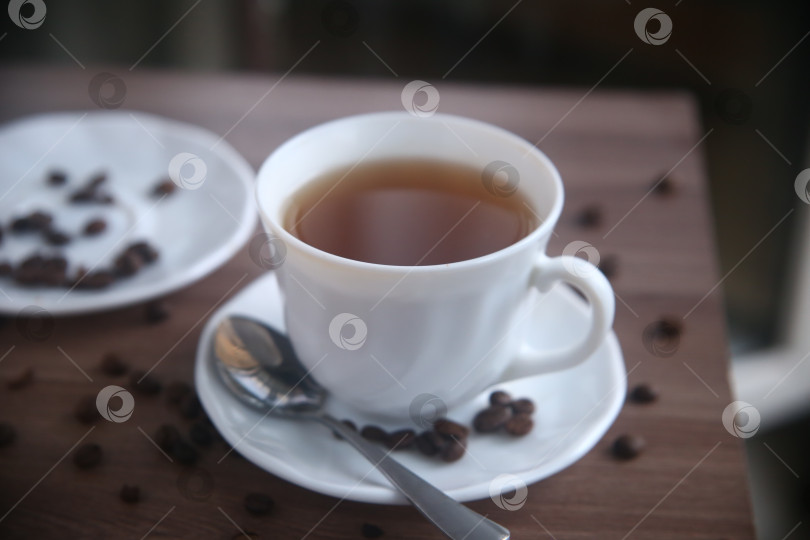 Скачать Кофе черный в чашке фотосток Ozero