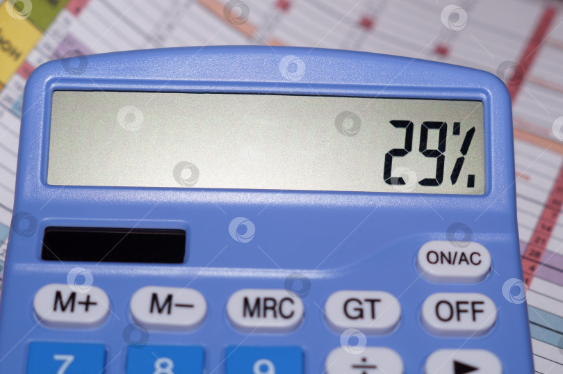 Скачать На табло калькулятора показано 29% фотосток Ozero