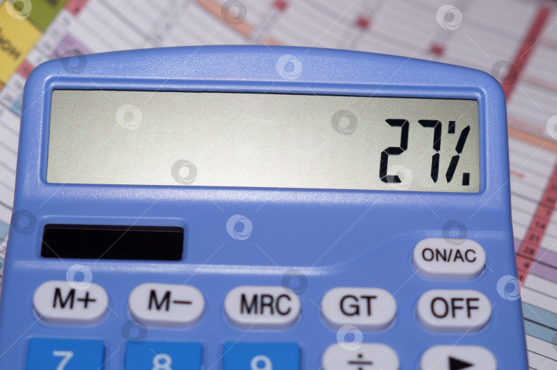Скачать На табло калькулятора показано 27% фотосток Ozero