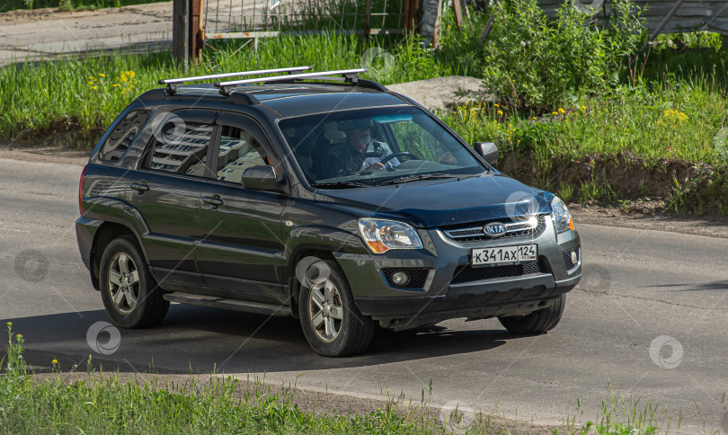 Скачать Россия, Красноярск 27 мая 2025г. автомобиль Kia Sportage Кроссовер фотосток Ozero