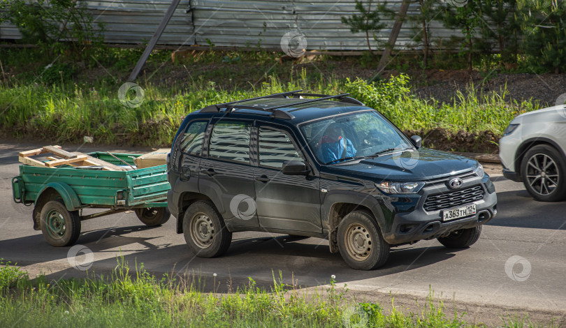 Скачать Россия,Сибирь 27 Мая 2025 год. Автомобиль Lada Niva Travel — российский автомобиль фотосток Ozero