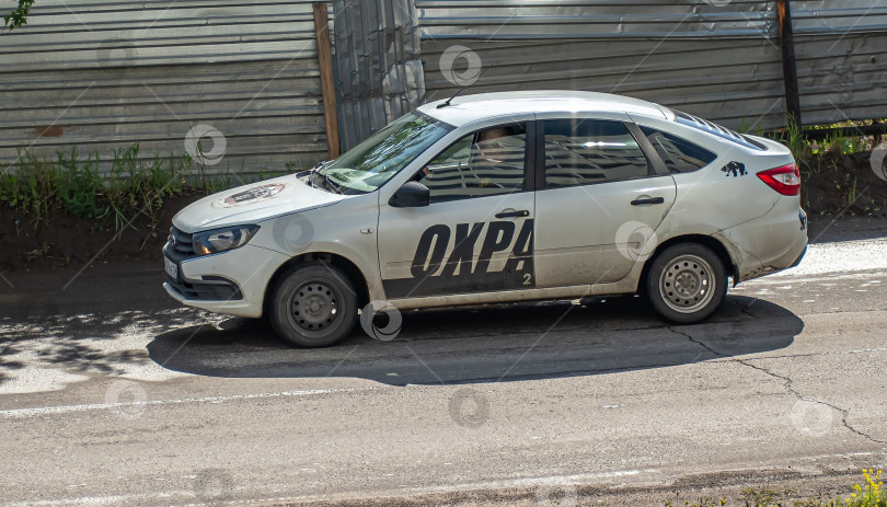 Скачать Россия,Сибирь 27 Мая 2025 год. Автомобиль  Лада гранта лифтбек фотосток Ozero