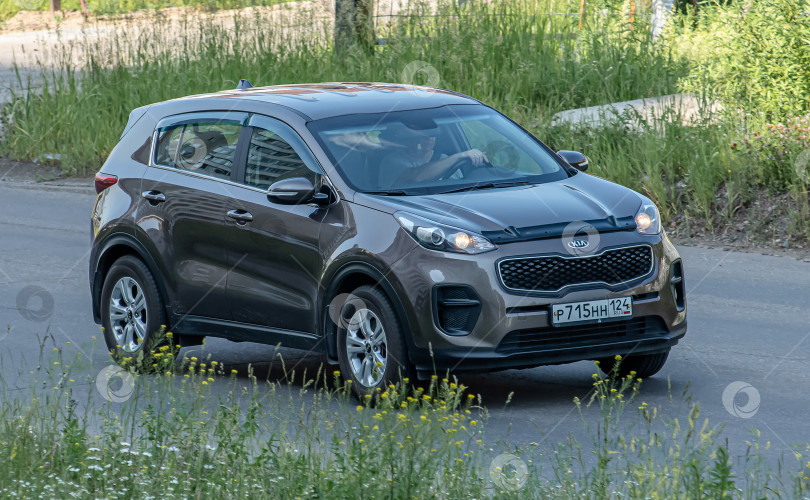 Скачать Россия,Сибирь 27 Мая 2025 год. Автомобиль Kia Sportage Кроссовер фотосток Ozero