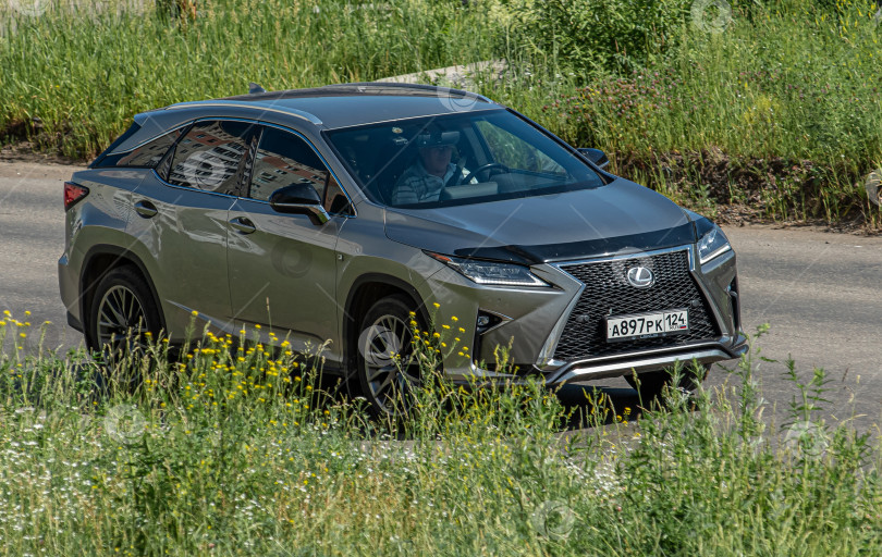 Скачать Россия,Сибирь 27 Мая 2025 год. Автомобиль Lexus RX 350 F Sport. фотосток Ozero