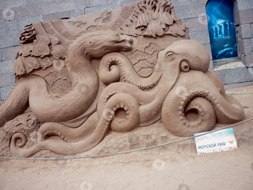 Скачать Осьминог из песка фотосток Ozero