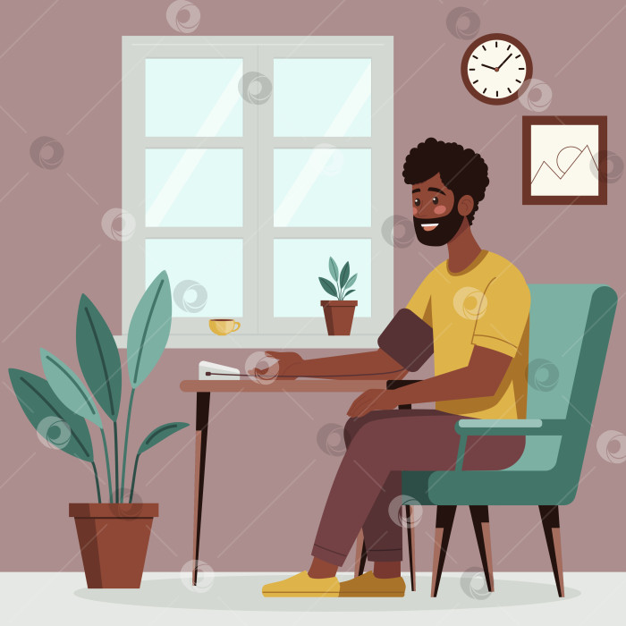 Скачать Темнокожий мужчина измеряет кровяное давление дома фотосток Ozero