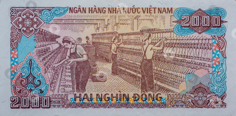 Скачать Россия,Сибирь, 09 июня 2022 года.Банкнота получила название 2000 Донг (Hai Nghin Dong) фотосток Ozero