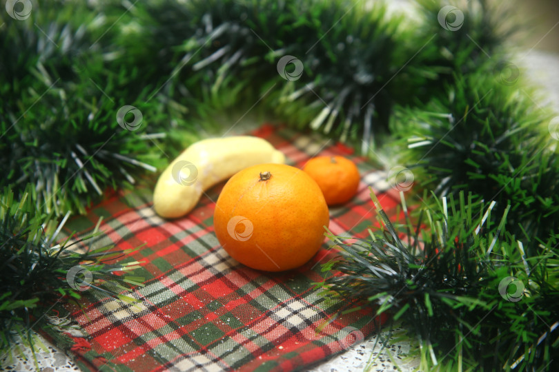 Скачать Фрукты мандарины на столе фотосток Ozero