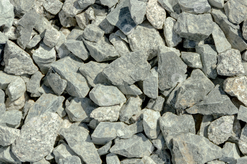 Скачать Текстура серого щебня – Каменистая поверхность для строительства и дизайна фотосток Ozero