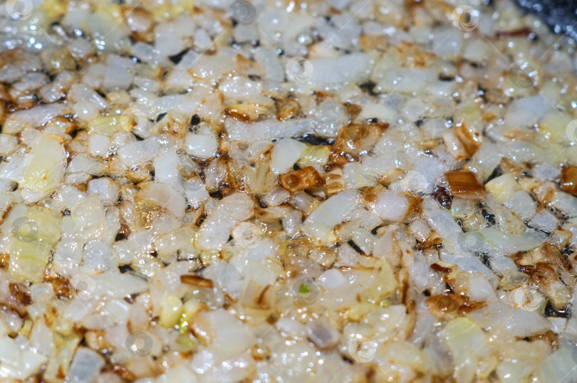 Скачать Готовка жаренного репчатого лука фотосток Ozero