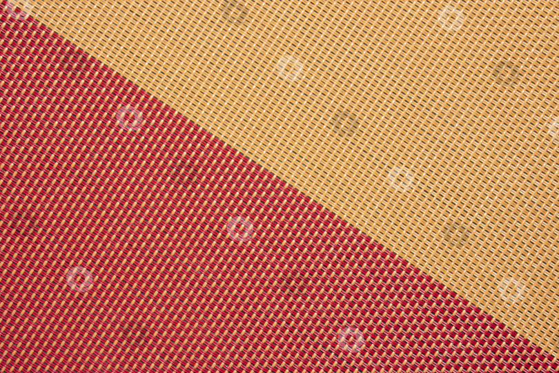 Скачать Текстура выполнена из соломы. Фон из соломенного переплетения.Текстура цветной плетеной соломы.Текстура плетеной соломы. фотосток Ozero