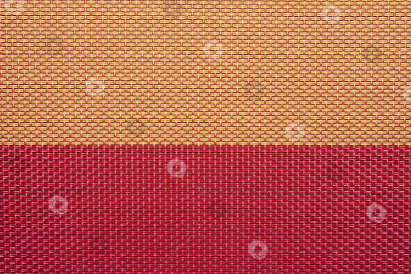 Скачать Текстура выполнена из соломы. Фон из соломенного переплетения.Текстура цветной плетеной соломы.Текстура плетеной соломы. фотосток Ozero