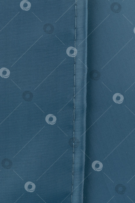 Скачать аккуратный шов на темном черепаховом полиэстере фотосток Ozero