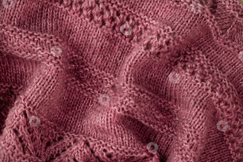 Скачать Крупный план вязаной шерстяной ткани пыльно-розового цвета фотосток Ozero
