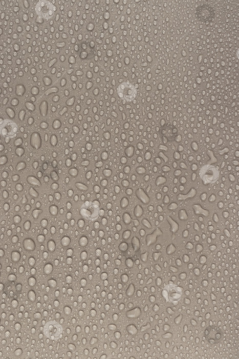 Скачать капли воды на бежевой ткани, вертикальные фотосток Ozero