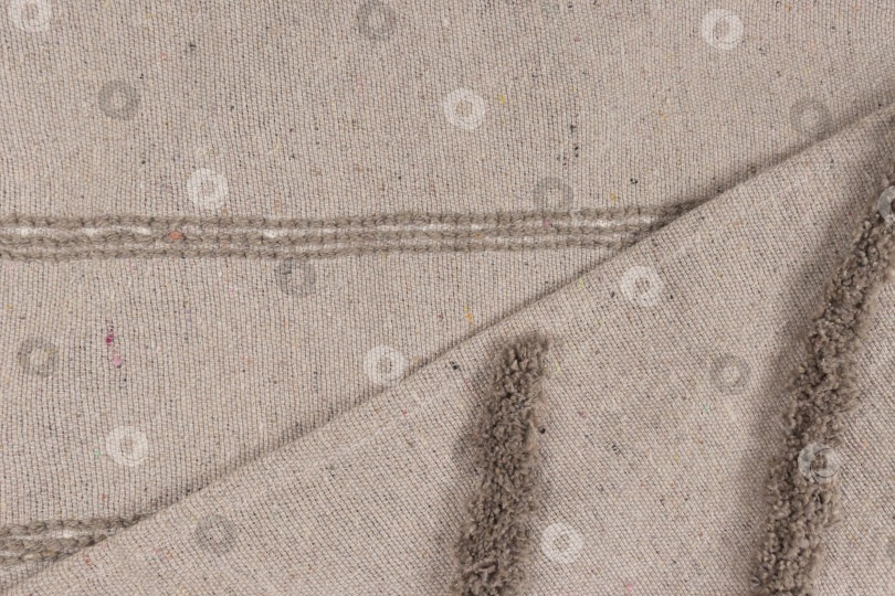 Скачать крупный план фактуры бежевой шотландки, изнаночная сторона фотосток Ozero