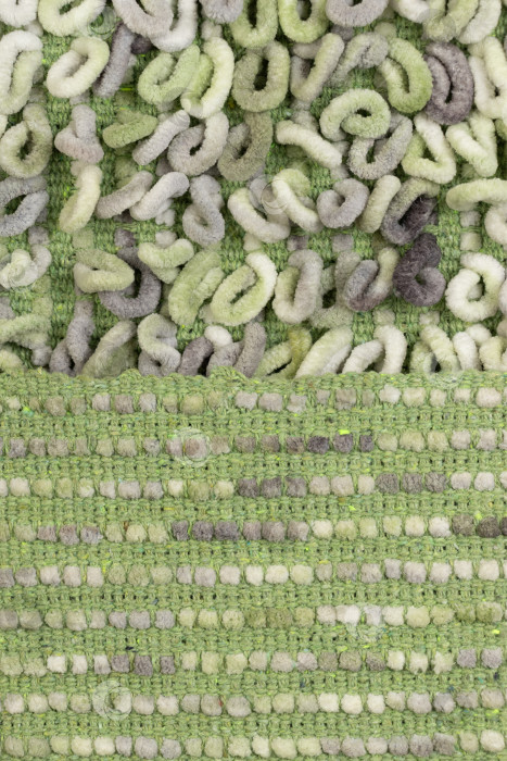 Скачать Зеленый меланжевый ковер с петлями: Текстильная отделка спереди и сзади фотосток Ozero