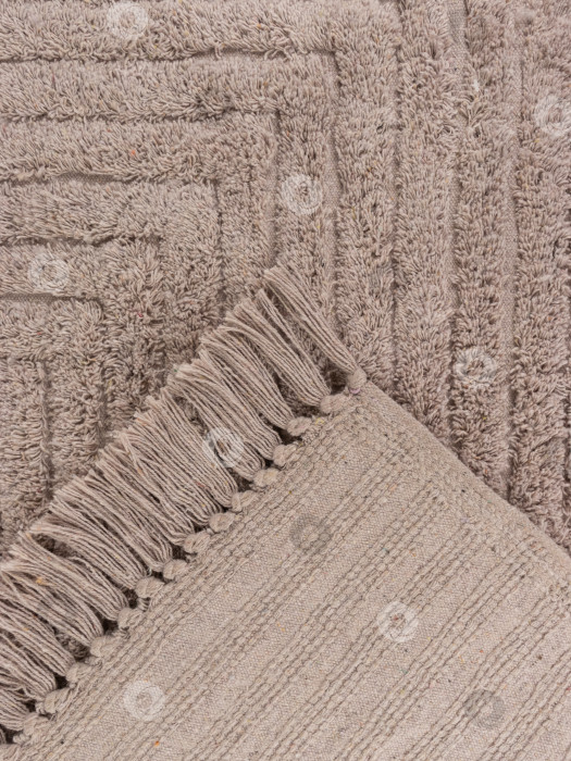 Скачать Хлопковый текстиль цвета капучино в деревенском стиле с бахромой и кисточками – экологичный аксессуар для домашнего декора ручной работы фотосток Ozero