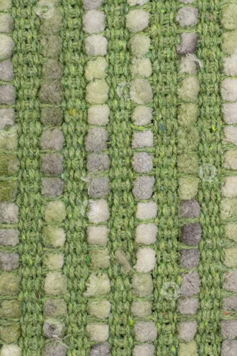 Скачать Задняя сторона тканого текстильного ковра зеленого Меланжа крупным планом фотосток Ozero